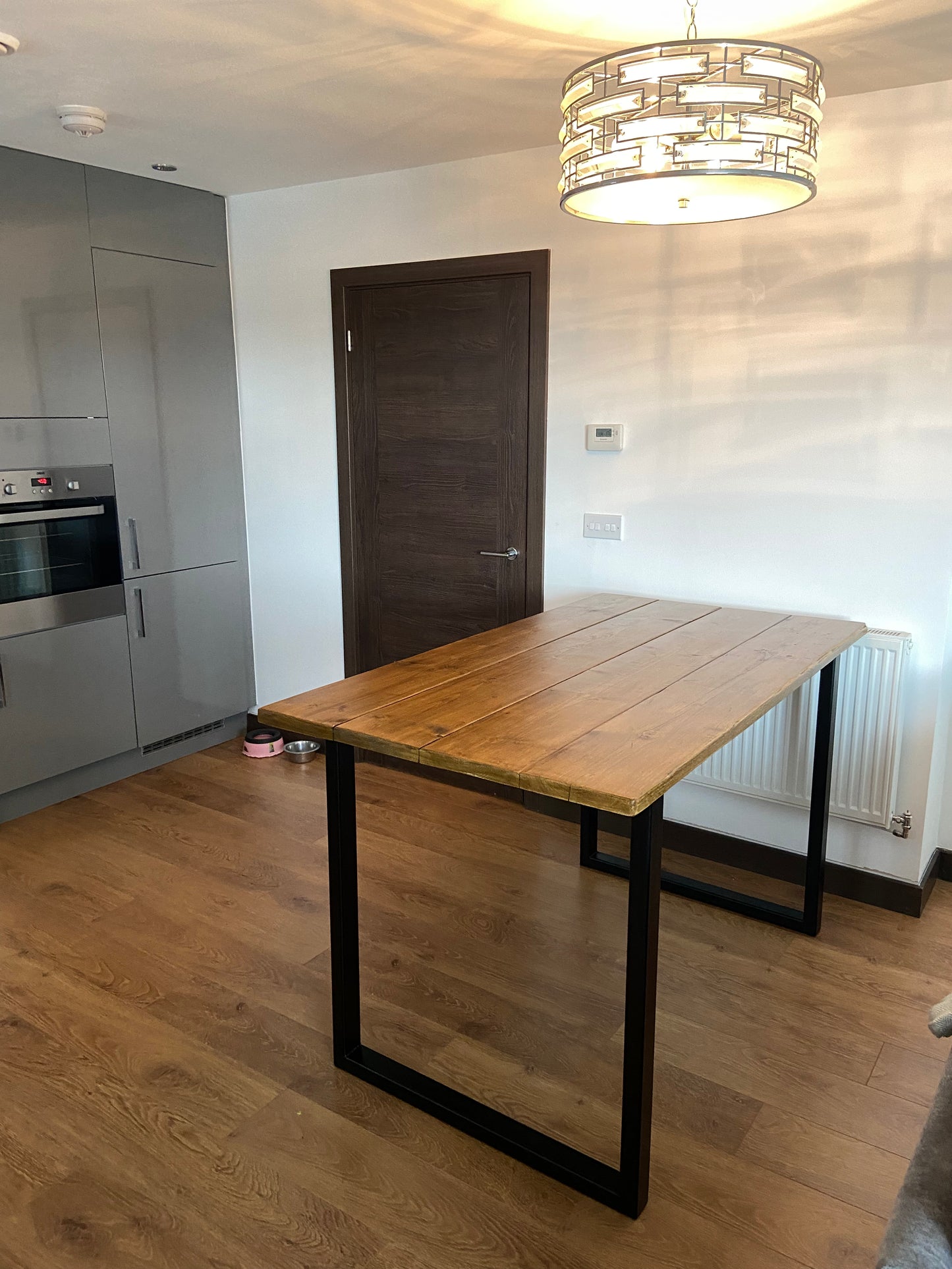 Handmade breakfast bar crafted from reclaimed scaffold boards