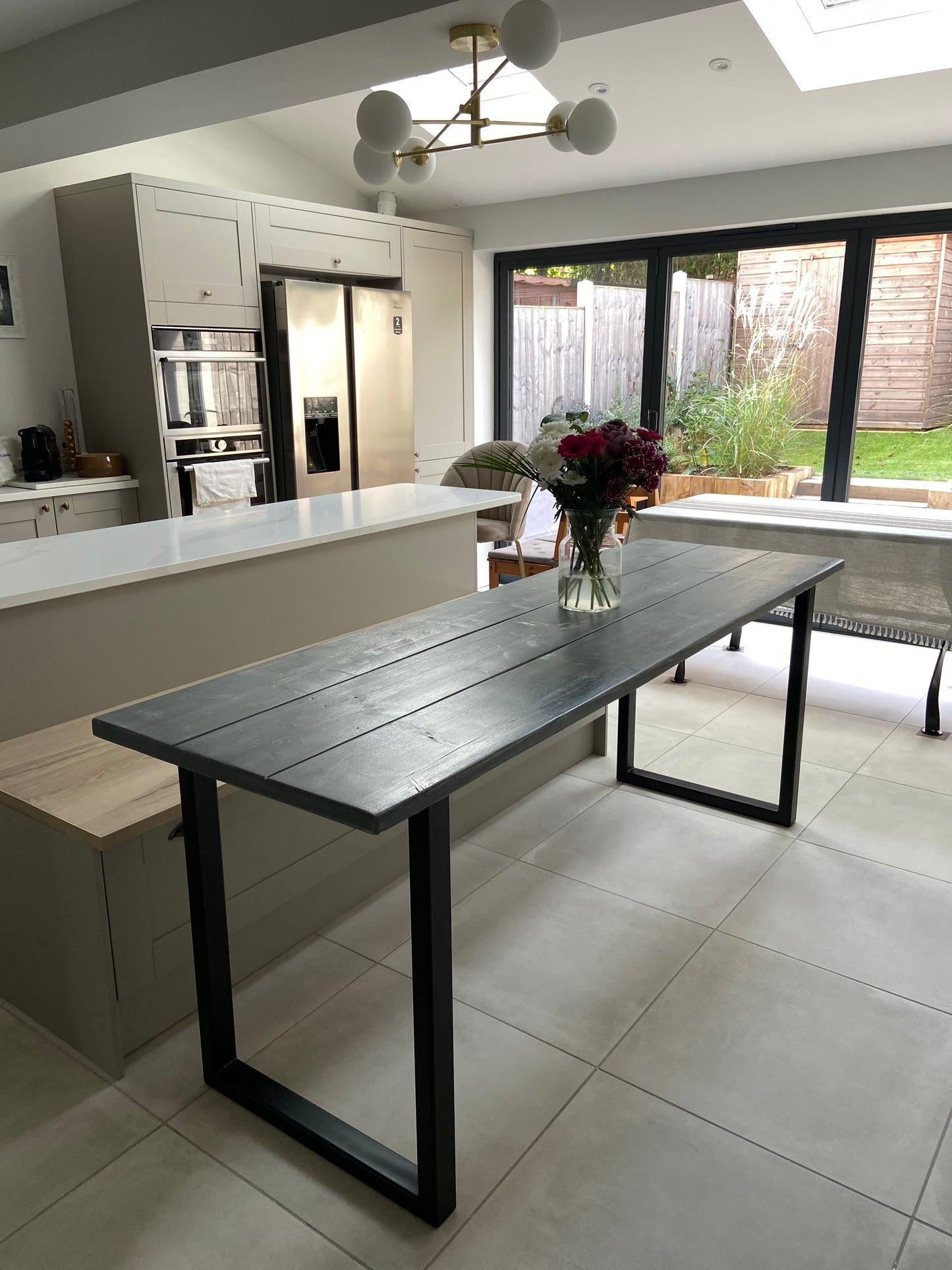 Handmade breakfast bar crafted from reclaimed scaffold boards