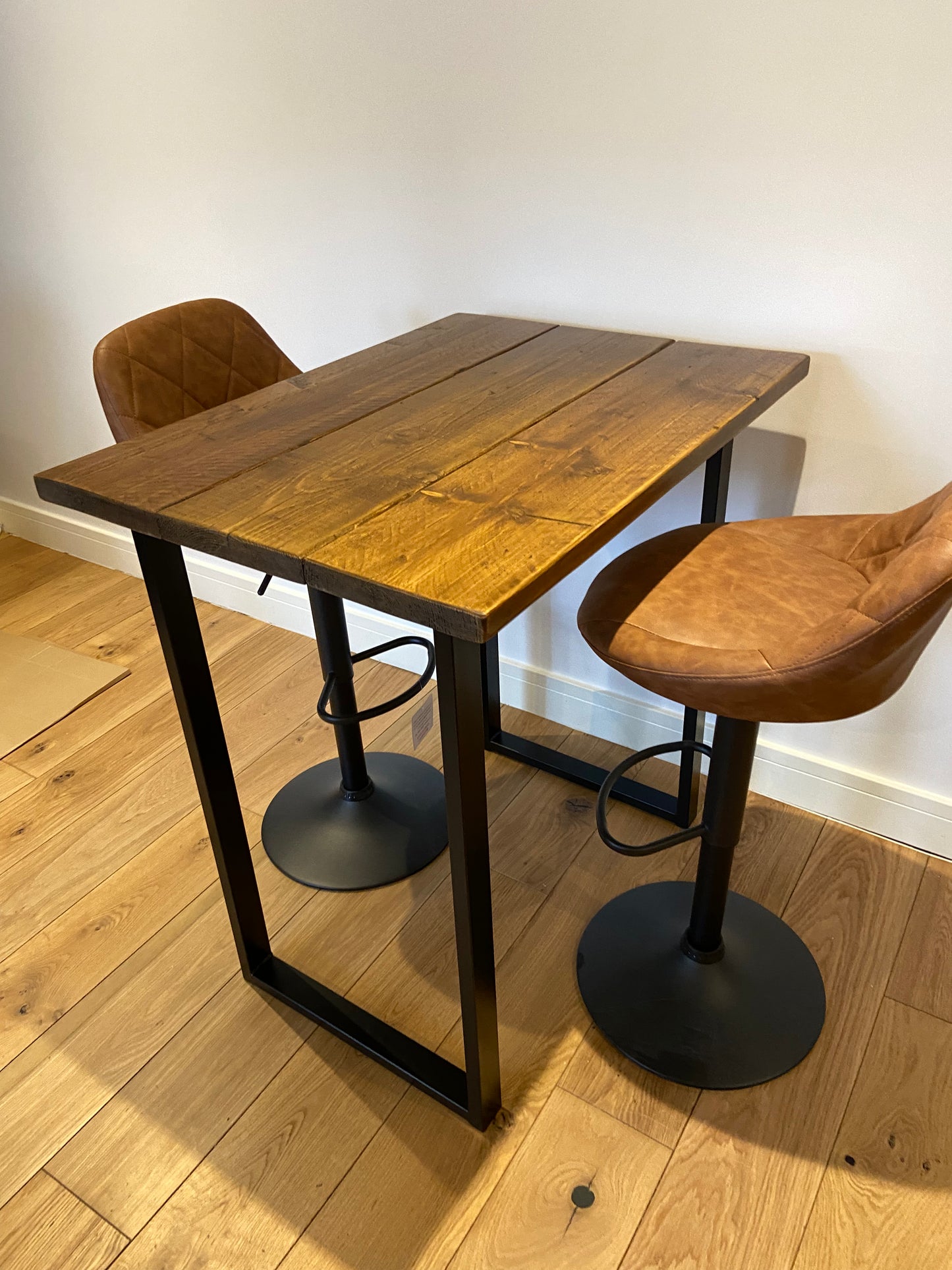 Handmade breakfast bar crafted from reclaimed scaffold boards