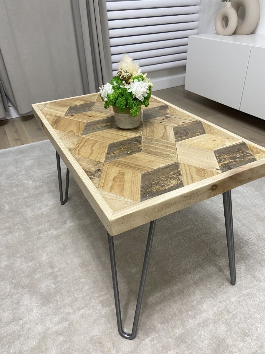 Handcrafted 3D reclaimed wood coffee table with block pattern top and black hairpin legs, rustic and modern design