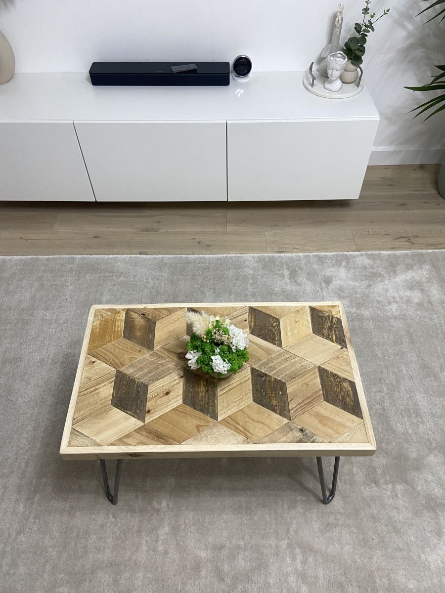 Handcrafted 3D reclaimed wood coffee table with block pattern top and black hairpin legs, rustic and modern design