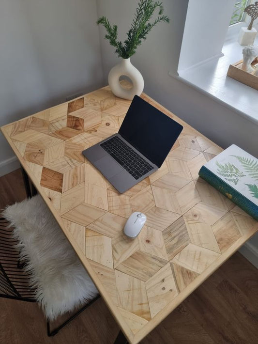 Handmade desk with 3D block pattern top crafted from reclaimed wood and industrial metal legs – sustainable design for home office or studio.
