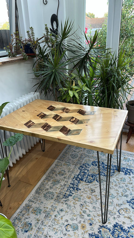 Reclaimed wood dining table with subtle 3D pattern top, handcrafted in the UK, finished with natural wax and showcasing rustic character details