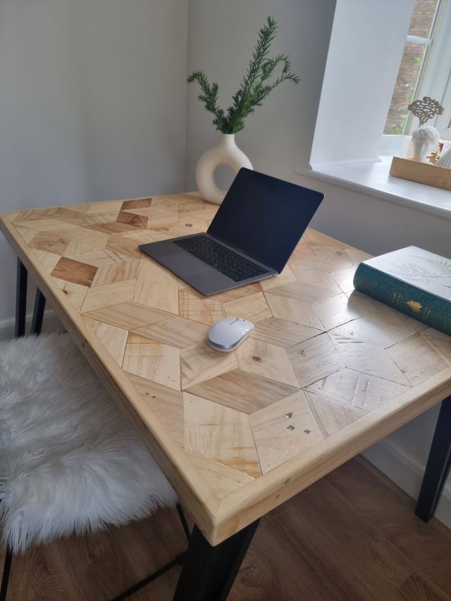 Handmade desk with 3D block pattern top crafted from reclaimed wood and industrial metal legs – sustainable design for home office or studio.
