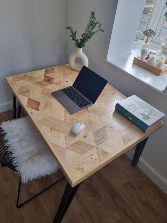 Handmade desk with 3D block pattern top crafted from reclaimed wood and industrial metal legs – sustainable design for home office or studio.
