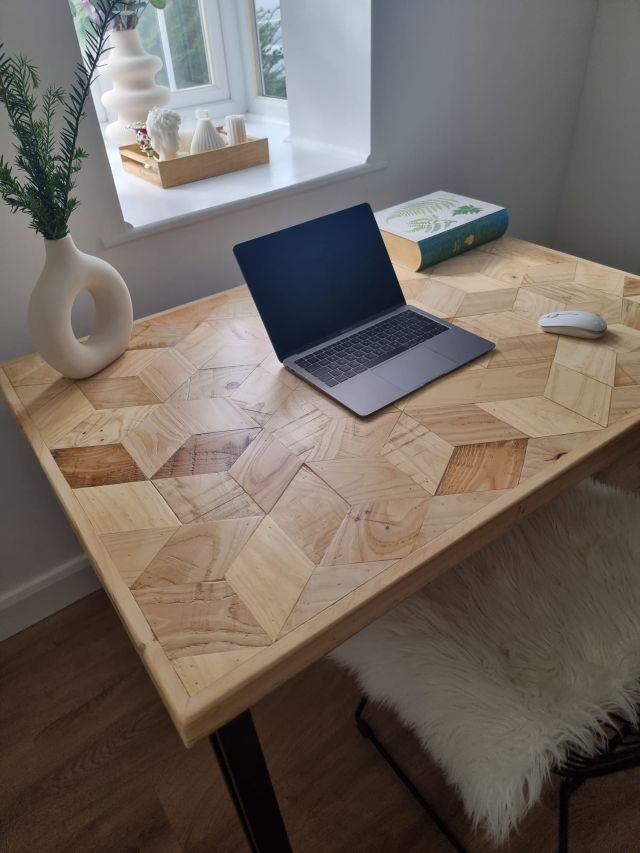 Handmade desk with 3D block pattern top crafted from reclaimed wood and industrial metal legs – sustainable design for home office or studio.