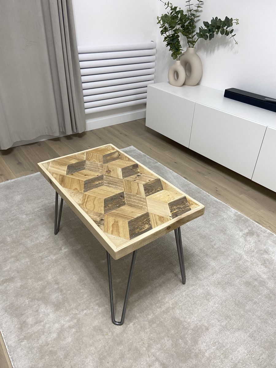 Handcrafted 3D reclaimed wood coffee table with block pattern top and black hairpin legs, rustic and modern design