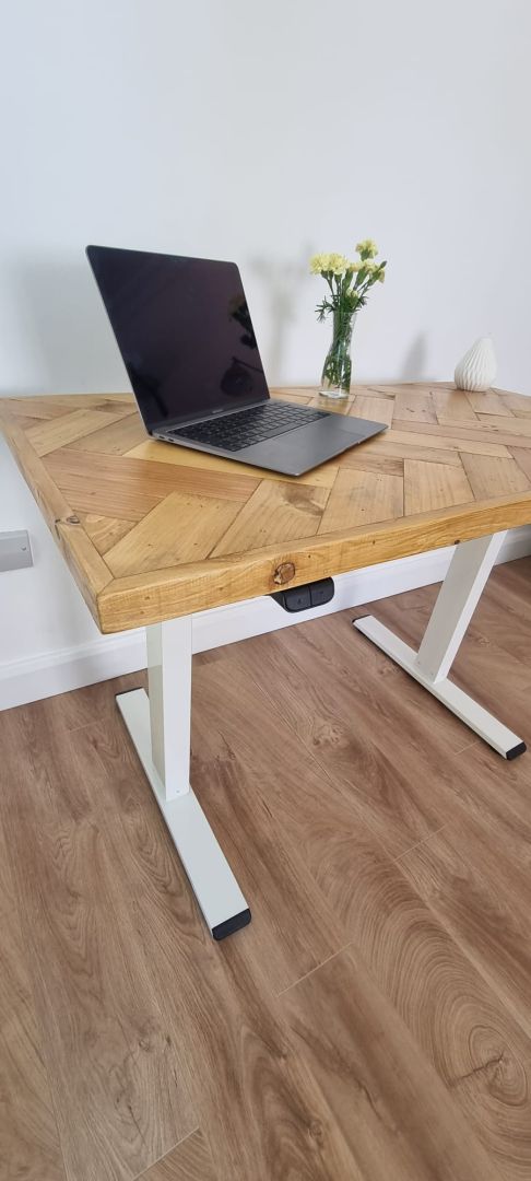 Adjustable height desk with reclaimed wood double herringbone top and electric legs, featuring LED smart handset with memory presets and child lock – handcrafted sit-stand desk for home or office.