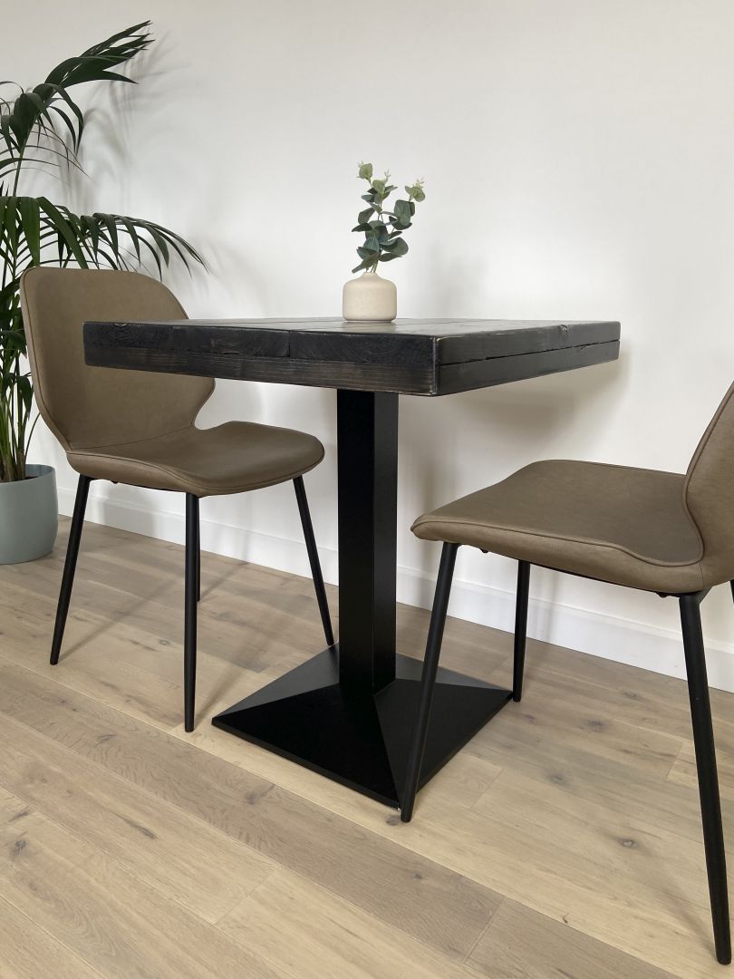 Square bistro table with reclaimed scaffold board top and black cast iron pedestal base, handcrafted in the UK with a smooth wax finish