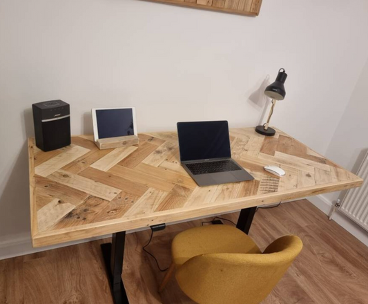 Adjustable height desk with reclaimed wood double herringbone top and electric legs, featuring LED smart handset with memory presets and child lock – handcrafted sit-stand desk for home or office.