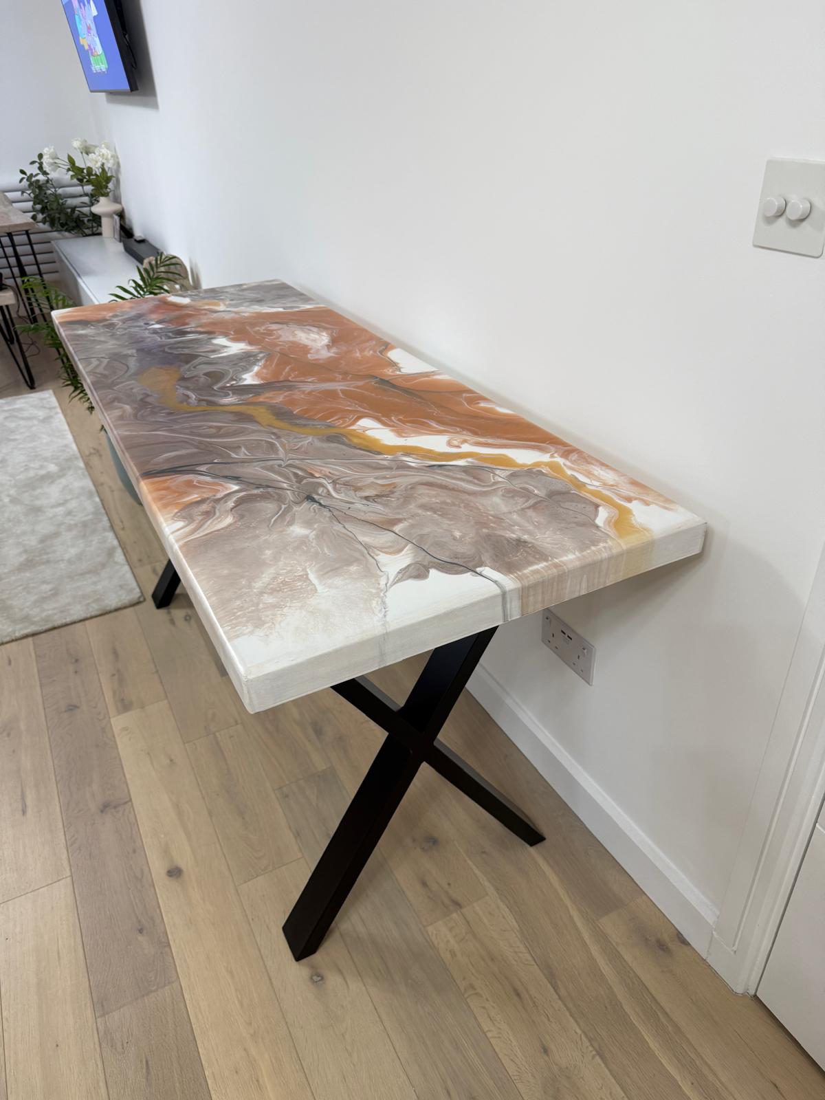 Handmade epoxy resin dining table with colourful pouring art design and custom metal legs – made to order in the UK.