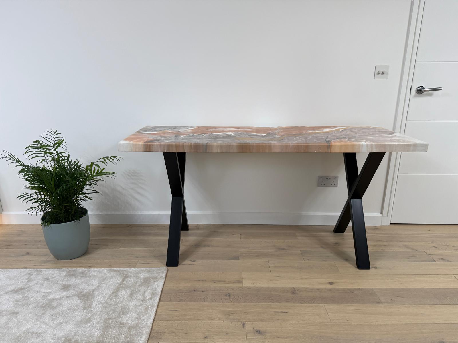 Handmade epoxy resin dining table with colourful pouring art design and custom metal legs – made to order in the UK.
