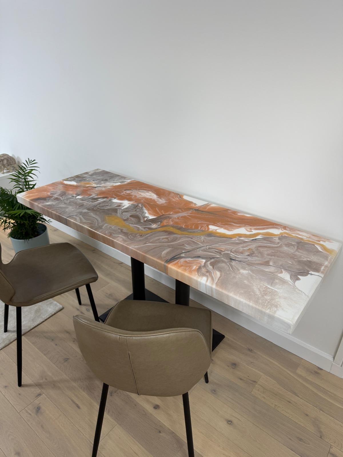 Handmade epoxy resin dining table with colourful pouring art design and custom metal legs – made to order in the UK.