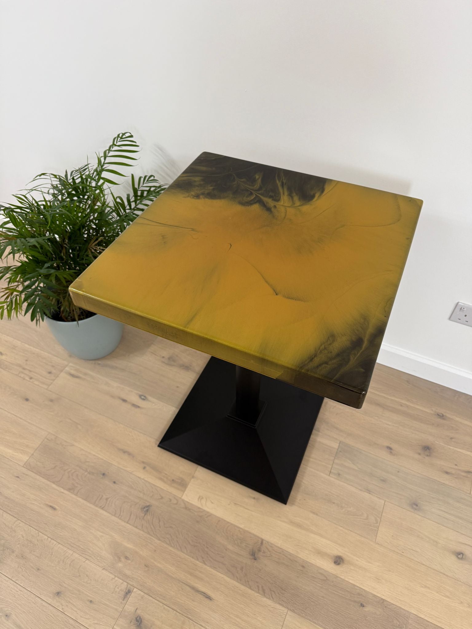 Handmade square epoxy resin dining table with artistic resin top and custom metal base – made to order in the UK.
