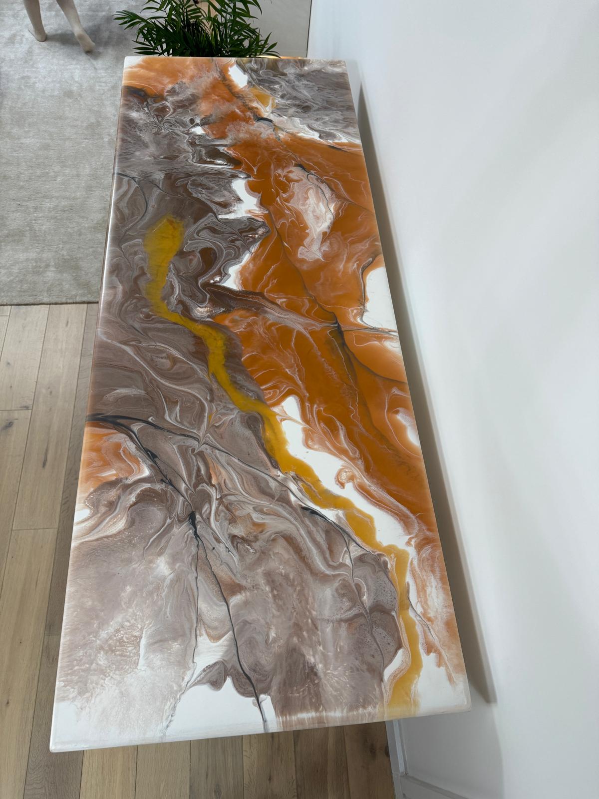 Handmade epoxy resin dining table with colourful pouring art design and custom metal legs – made to order in the UK.