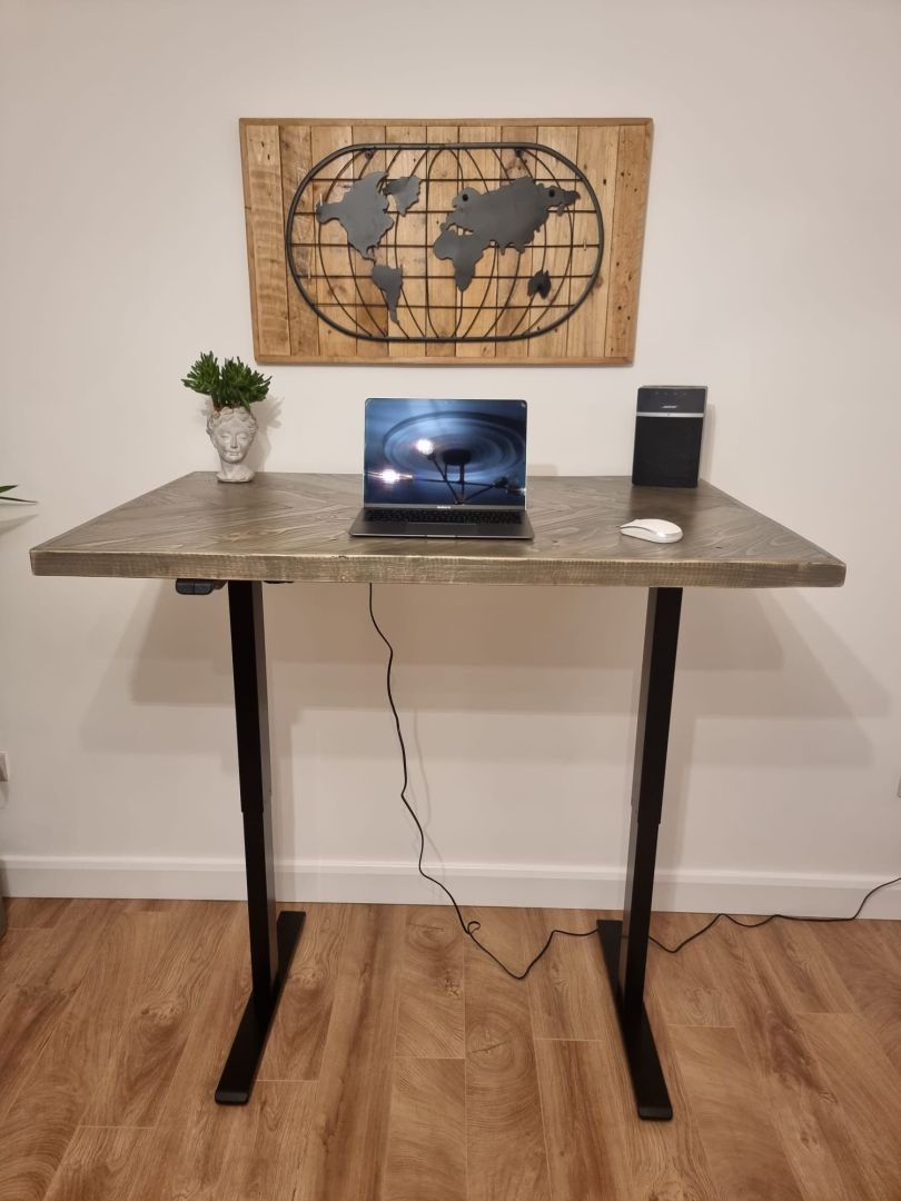 Adjustable height desk with reclaimed wood herringbone top and electric legs, featuring LED smart handset with memory presets and child lock – handcrafted sit-stand desk for home or office.