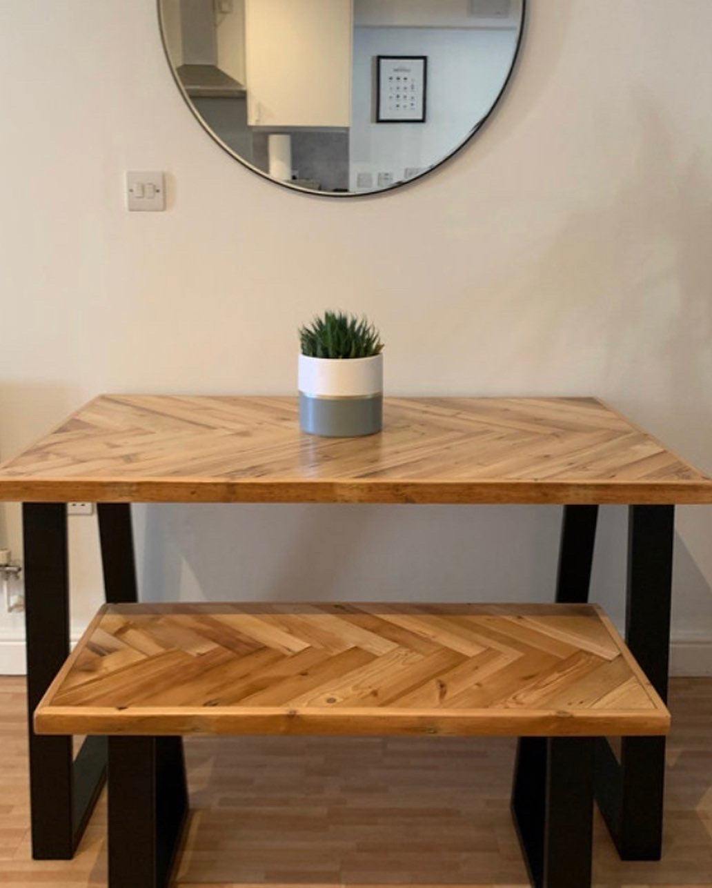 Handmade herringbone table crafted from reclaimed wood with metal legs, made to order in the UK