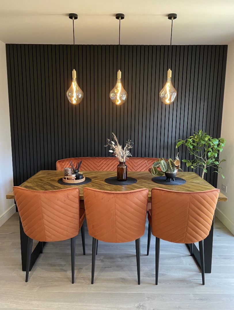 Handcrafted herringbone dining table made from reclaimed wood