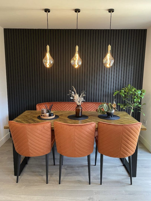 Handcrafted herringbone dining table made from reclaimed wood