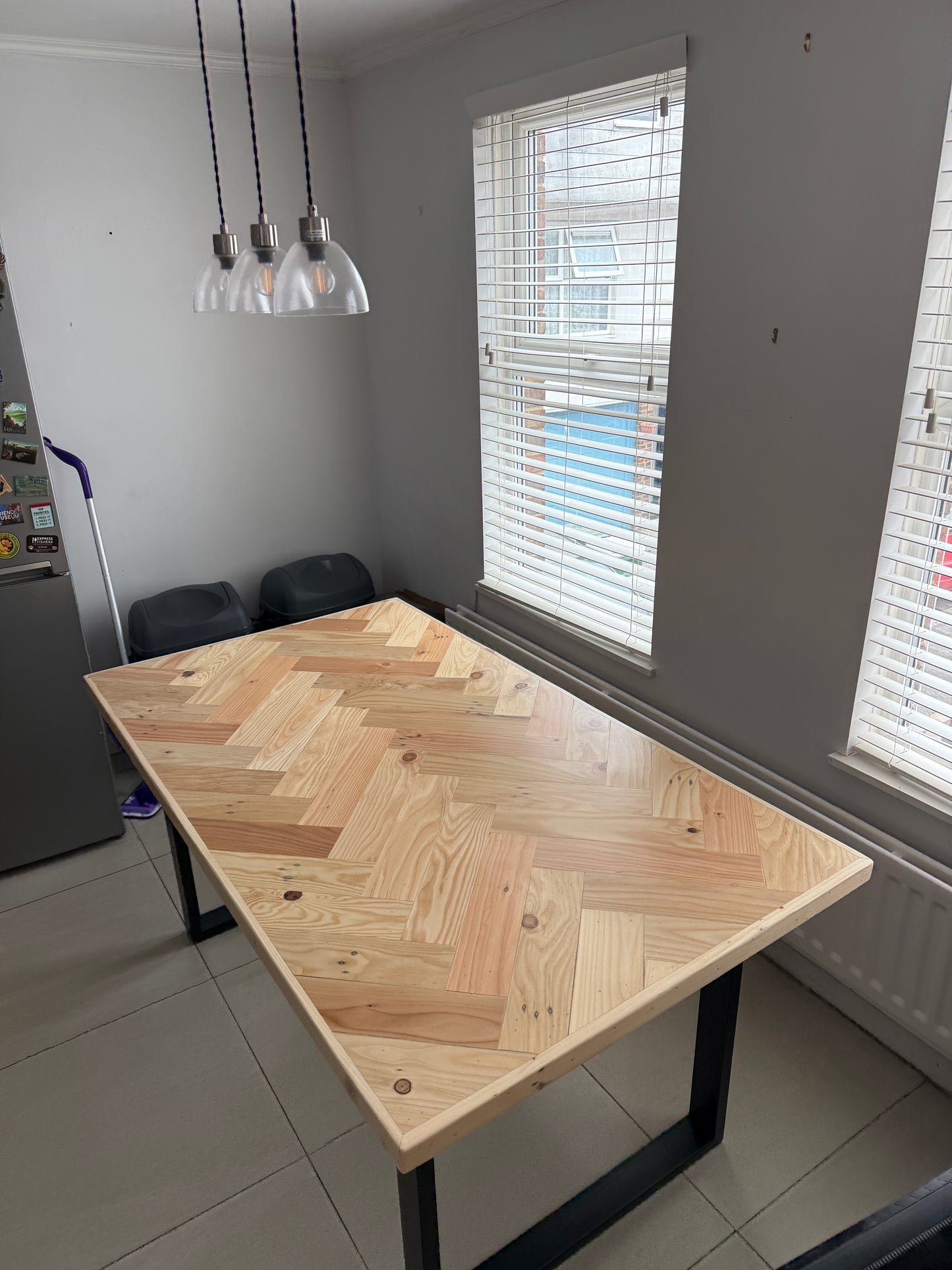 Handcrafted Herringbone Dining Table with Reclaimed Wood and Custom Legs - The Rough Wood UK