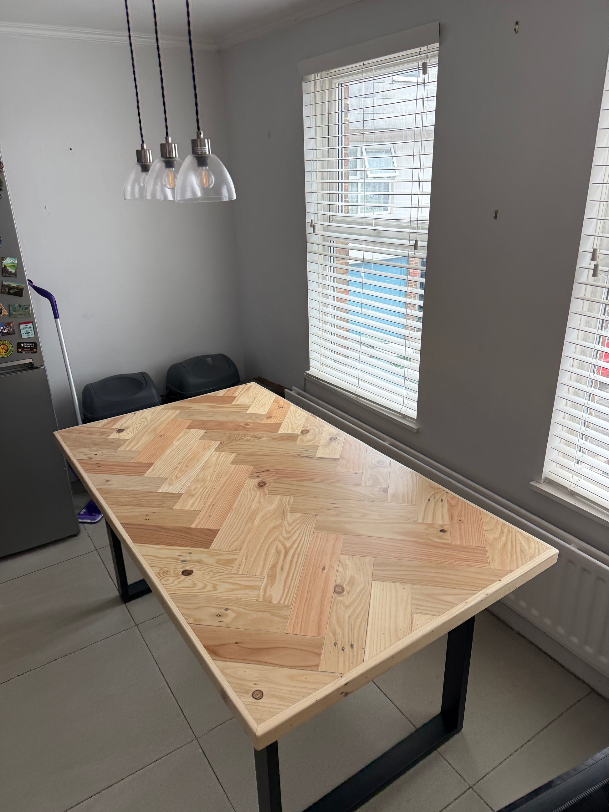 Handcrafted Herringbone Dining Table with Reclaimed Wood and Custom Legs - The Rough Wood UK