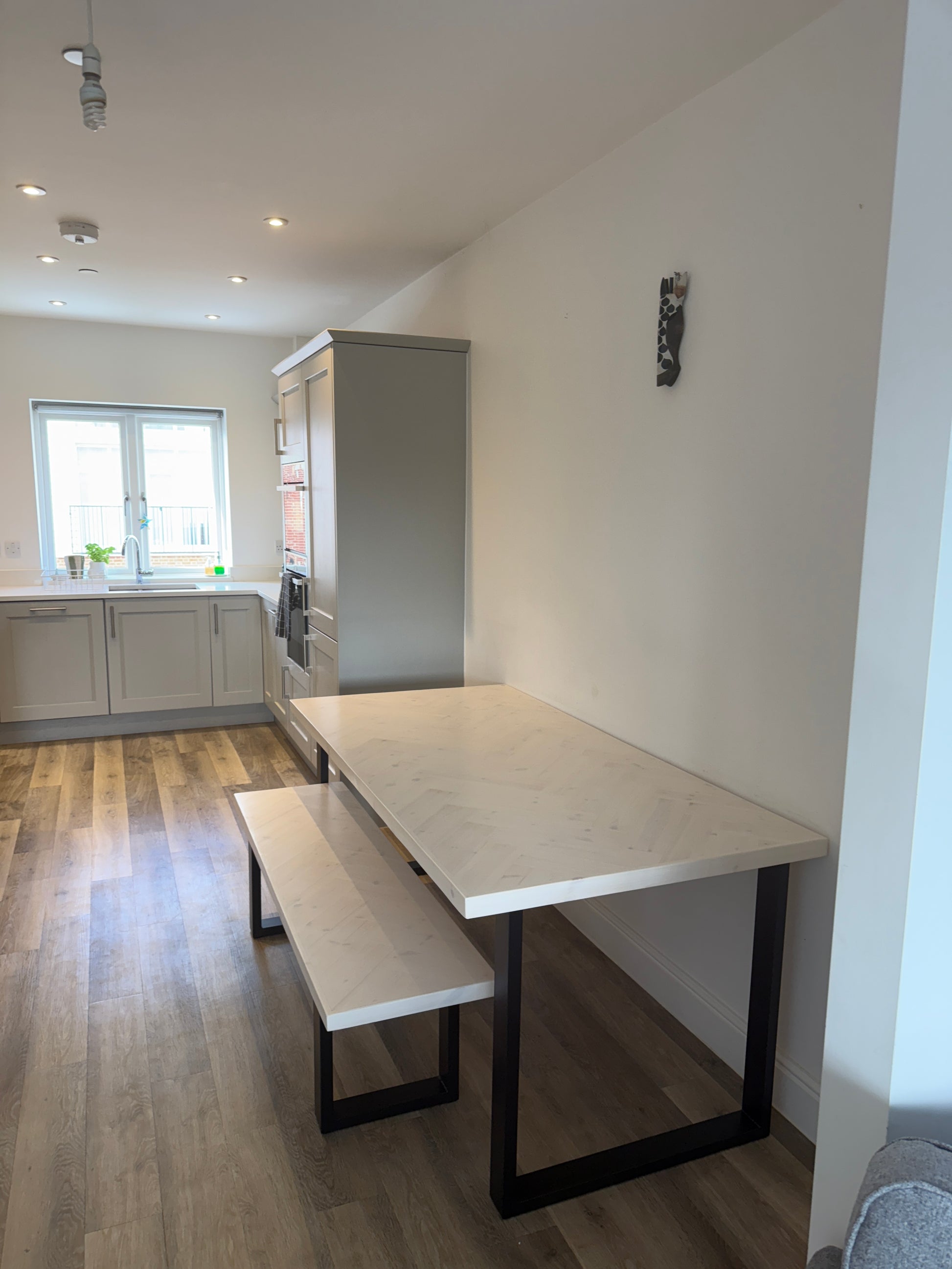 Handcrafted Herringbone Dining Table with Reclaimed Wood and Custom Legs - The Rough Wood UK