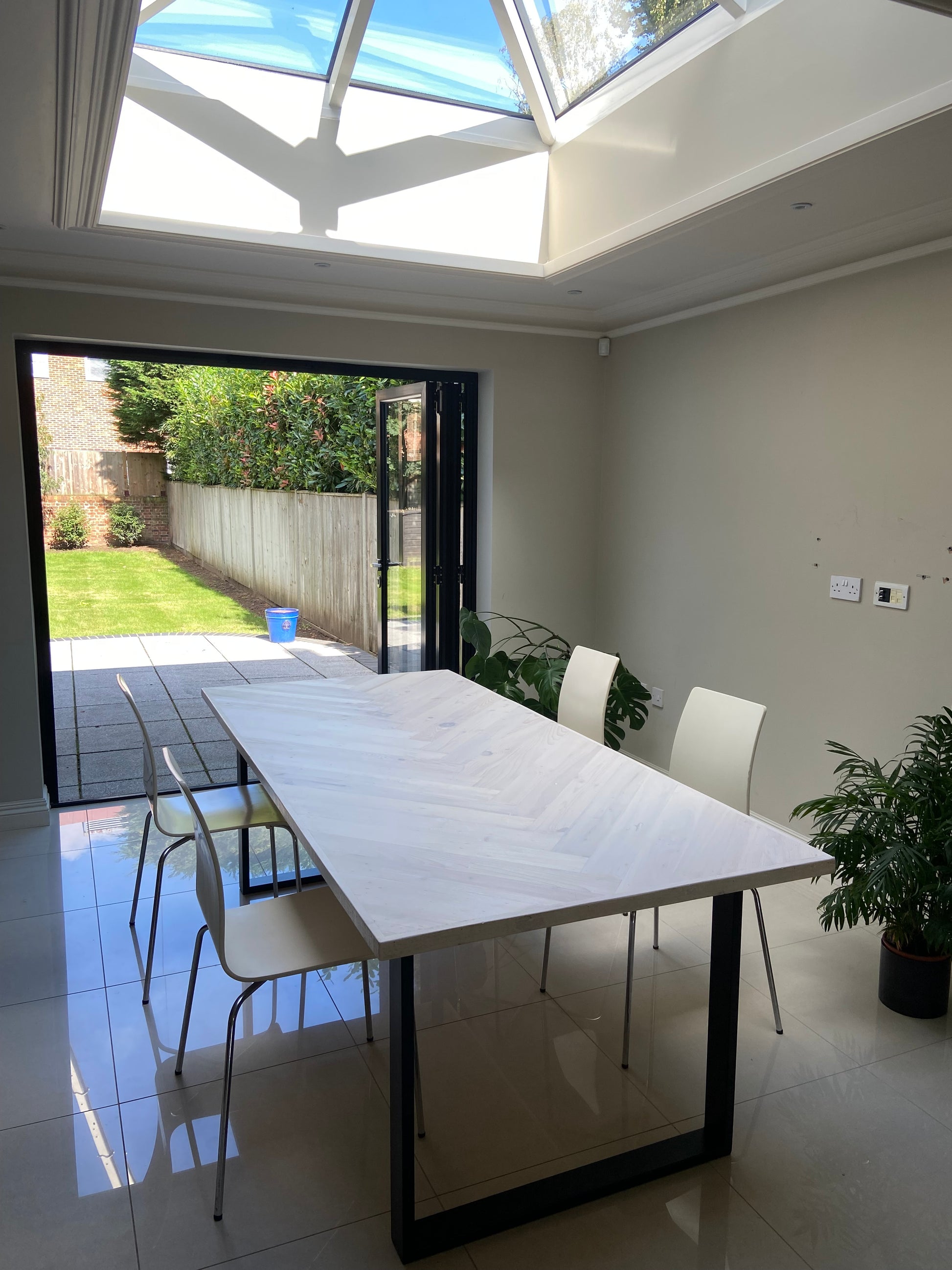 Handcrafted Herringbone Dining Table with Reclaimed Wood and Custom Legs - The Rough Wood UK