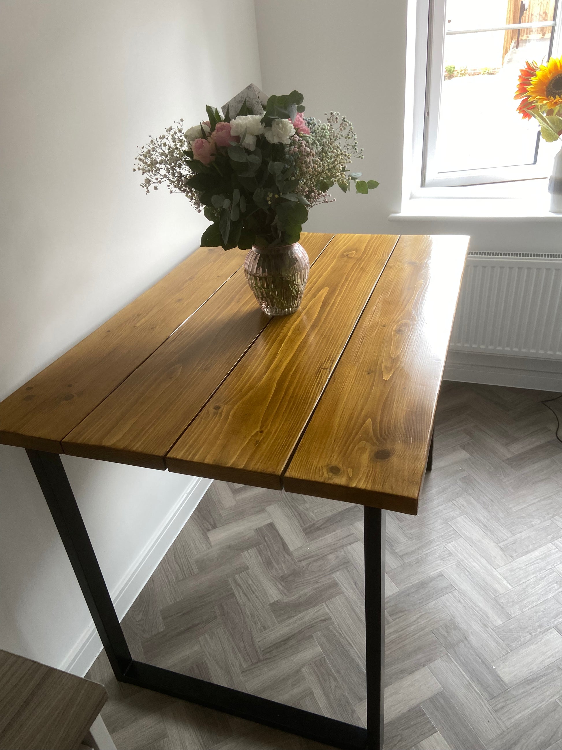 Handmade breakfast bar crafted from reclaimed scaffold boards