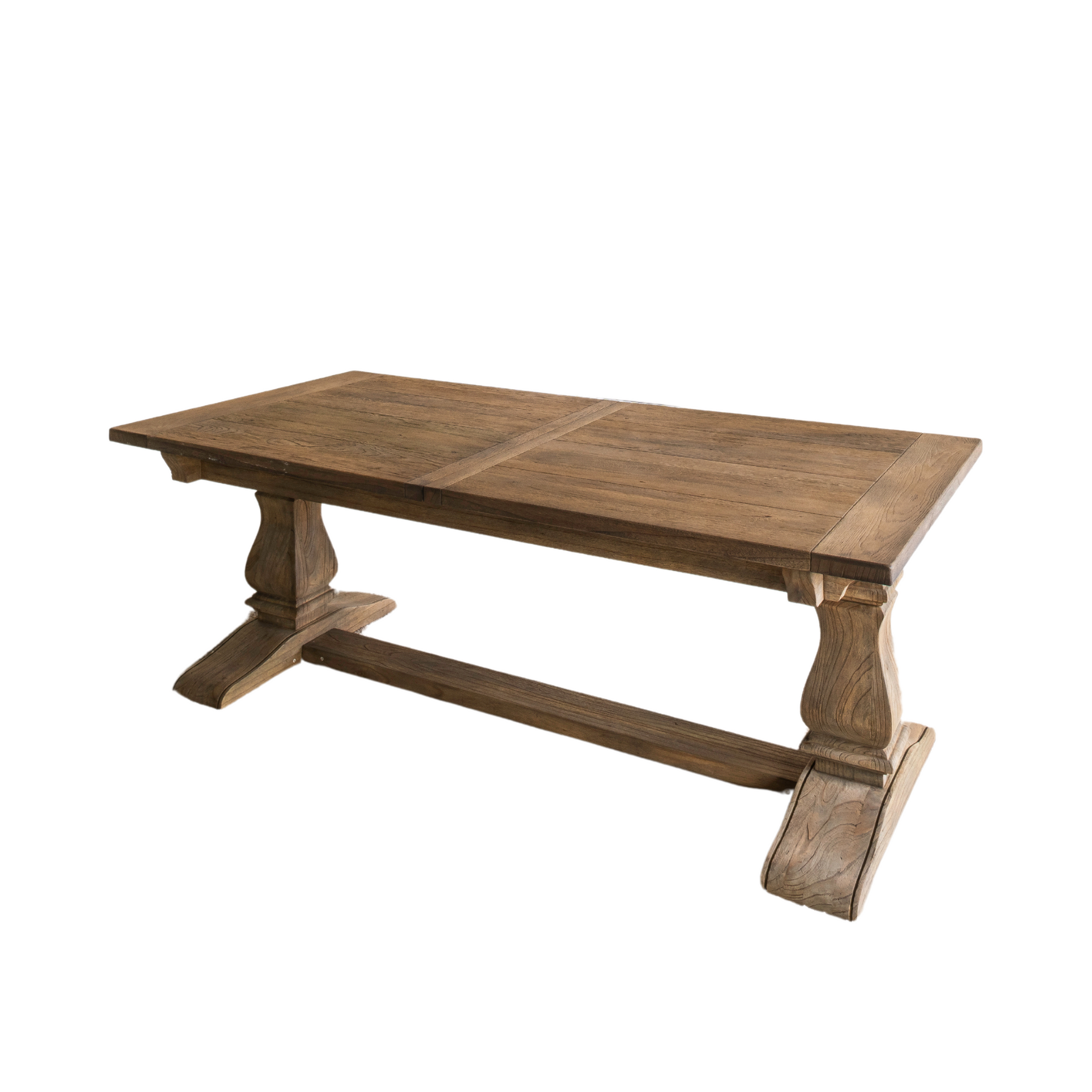 Solid oak extending dining table with pedestal base, shown styled in a neutral dining room. Part of the Elmstead Series by TheRoughWood.
