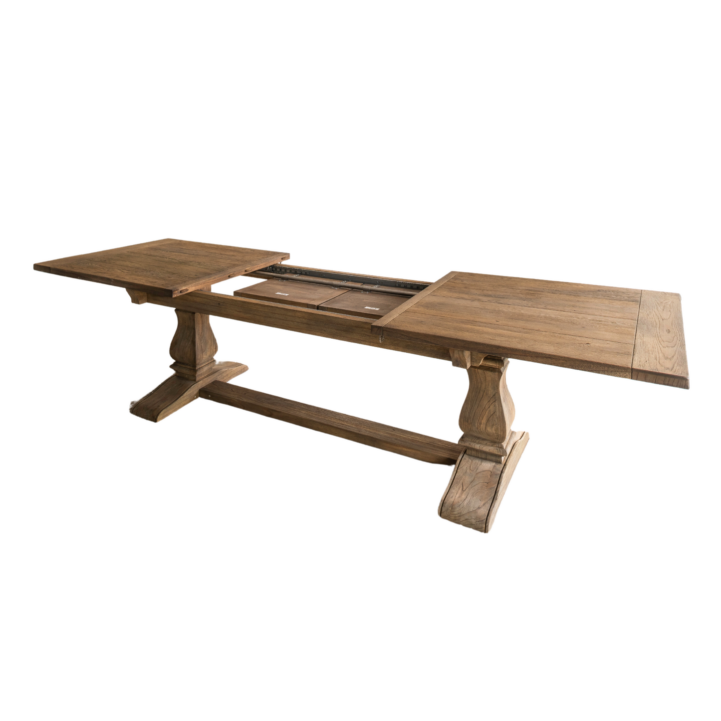 Solid oak extending dining table with pedestal base, shown styled in a neutral dining room. Part of the Elmstead Series by TheRoughWood.