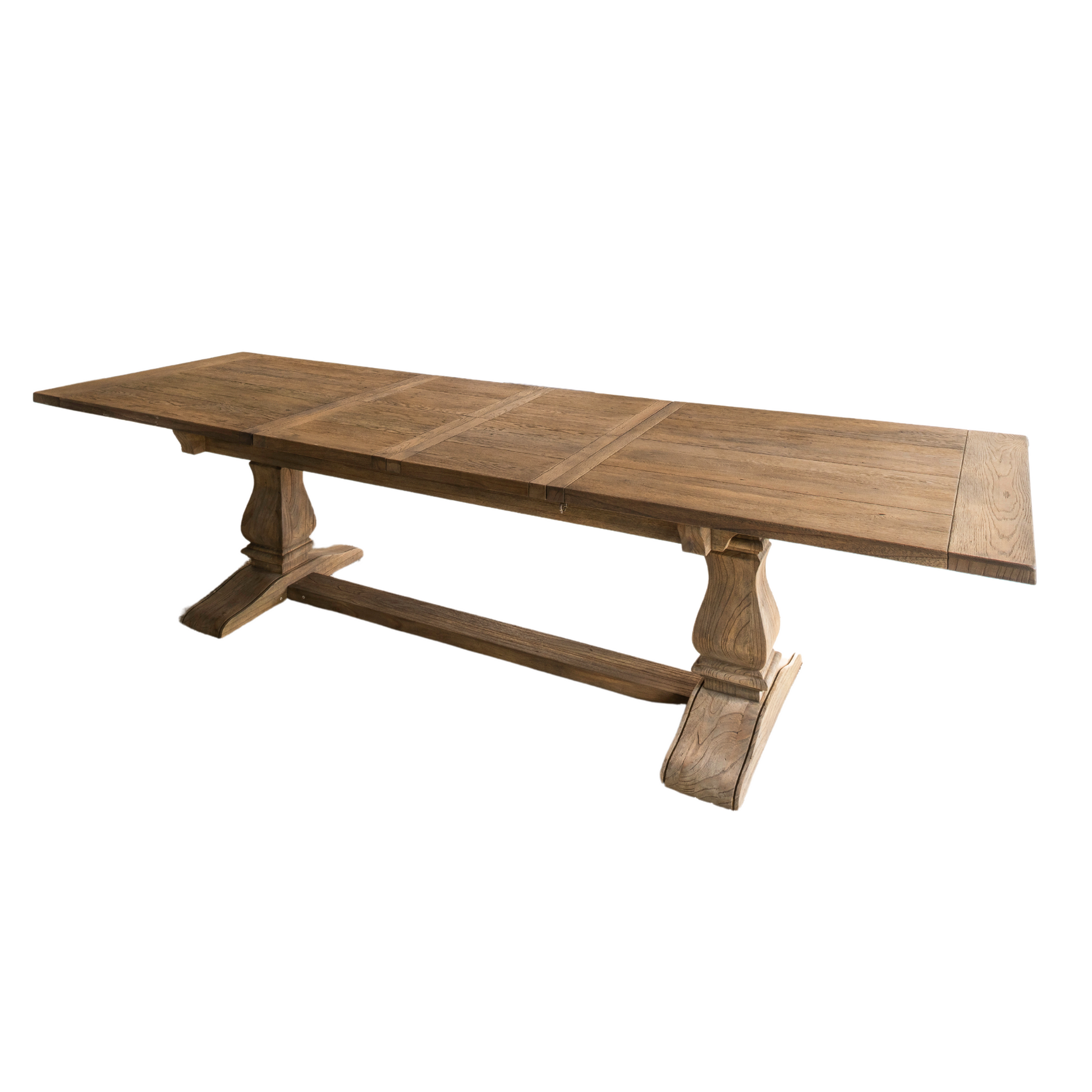 Solid oak extending dining table with pedestal base, shown styled in a neutral dining room. Part of the Elmstead Series by TheRoughWood.