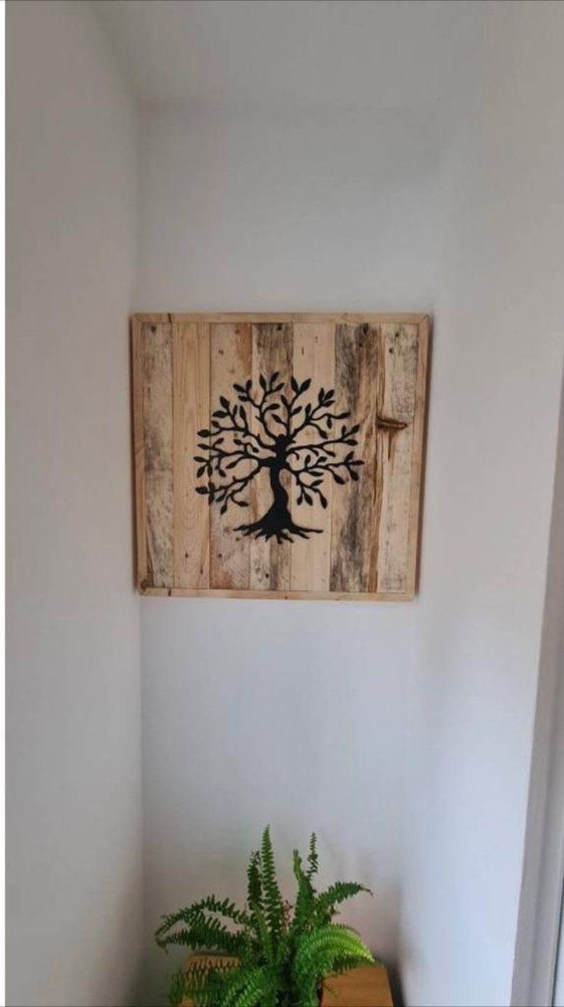 Handmade reclaimed wood wall art featuring Tree of Life or World Map metal inlay – rustic and eco-friendly décor piece