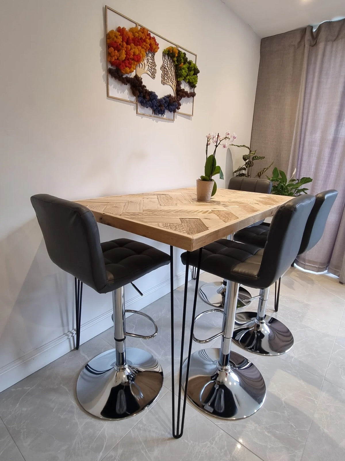 Handmade herringbone breakfast bar crafted from reclaimed wood with custom metal legs, made to order in the UK