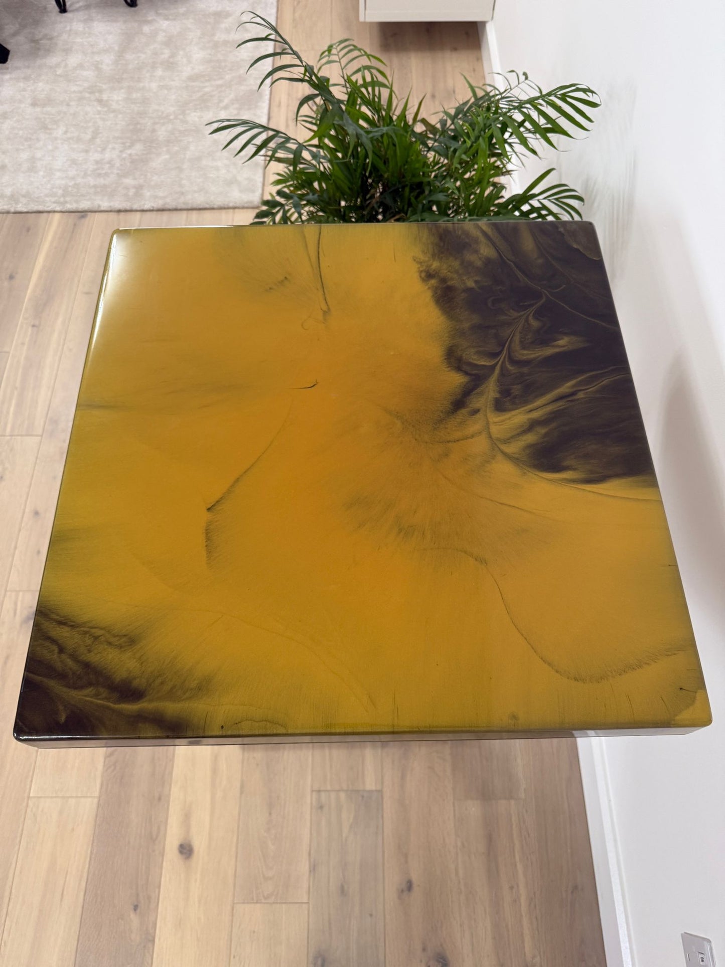 Handmade square epoxy resin dining table with artistic resin top and custom metal base – made to order in the UK.
