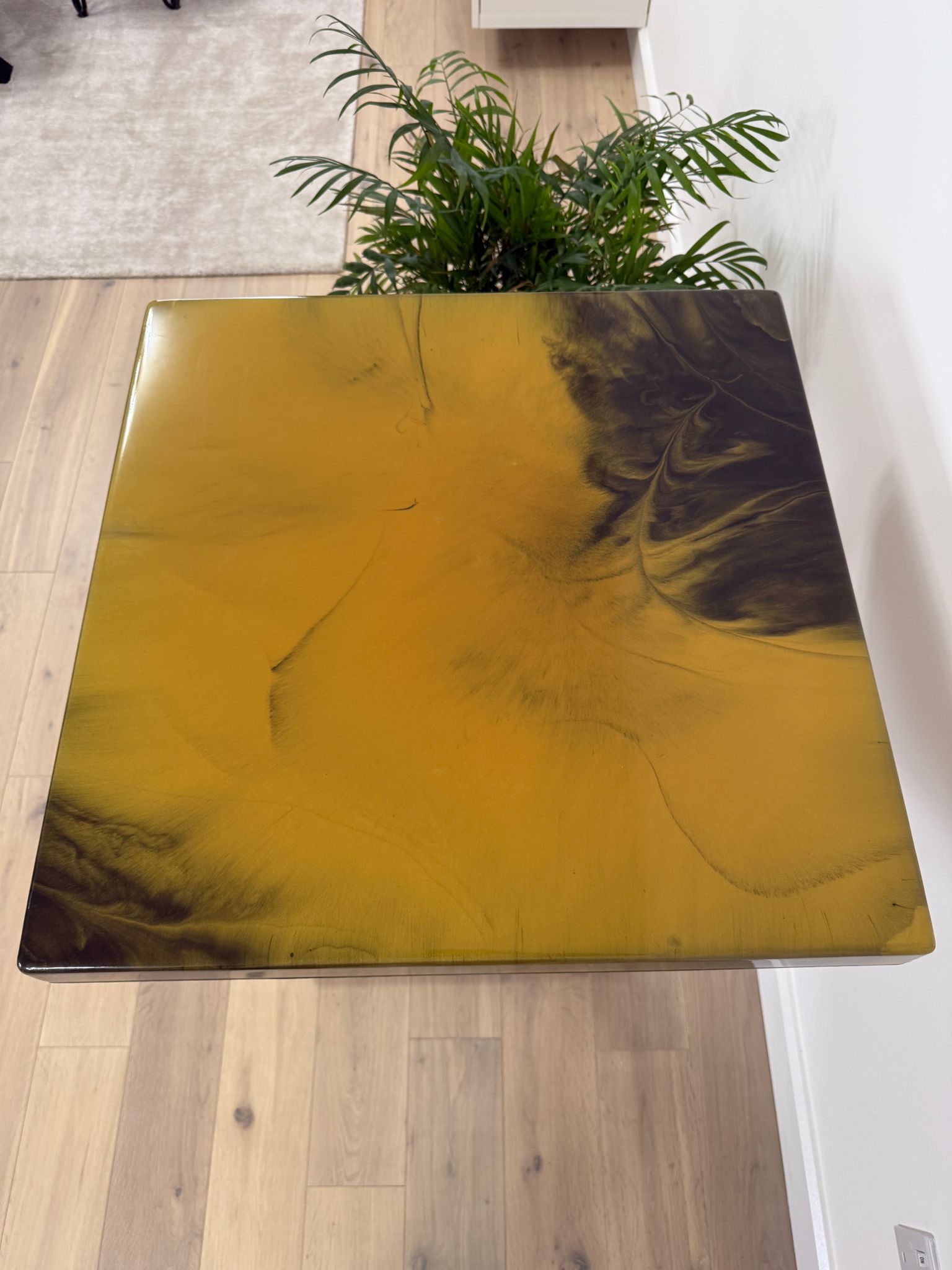 Handmade square epoxy resin dining table with artistic resin top and custom metal base – made to order in the UK.