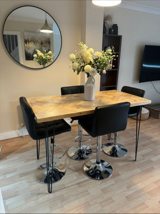 Handmade herringbone breakfast bar crafted from reclaimed wood with custom metal legs, made to order in the UK