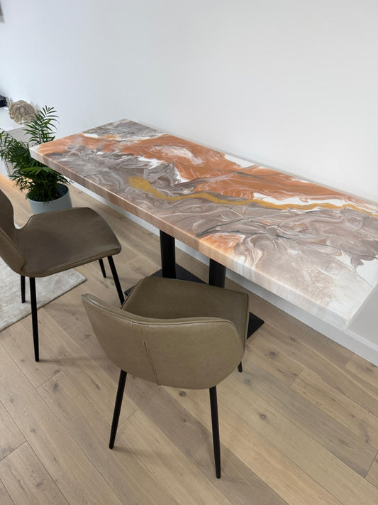 Handmade epoxy resin dining table with colourful pouring art design and custom metal legs – made to order in the UK.