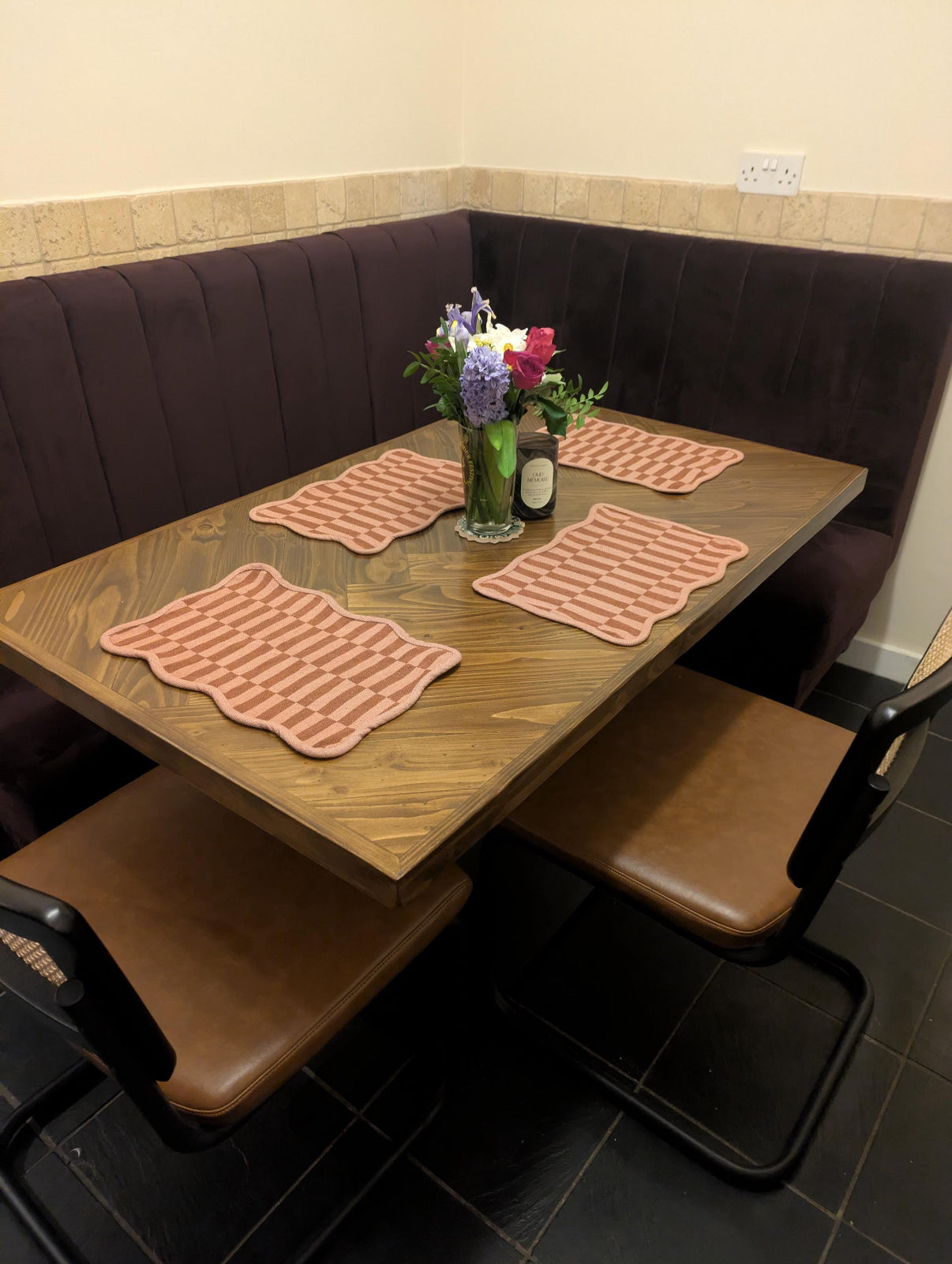 Handmade herringbone dining table with matching reclaimed wood benches