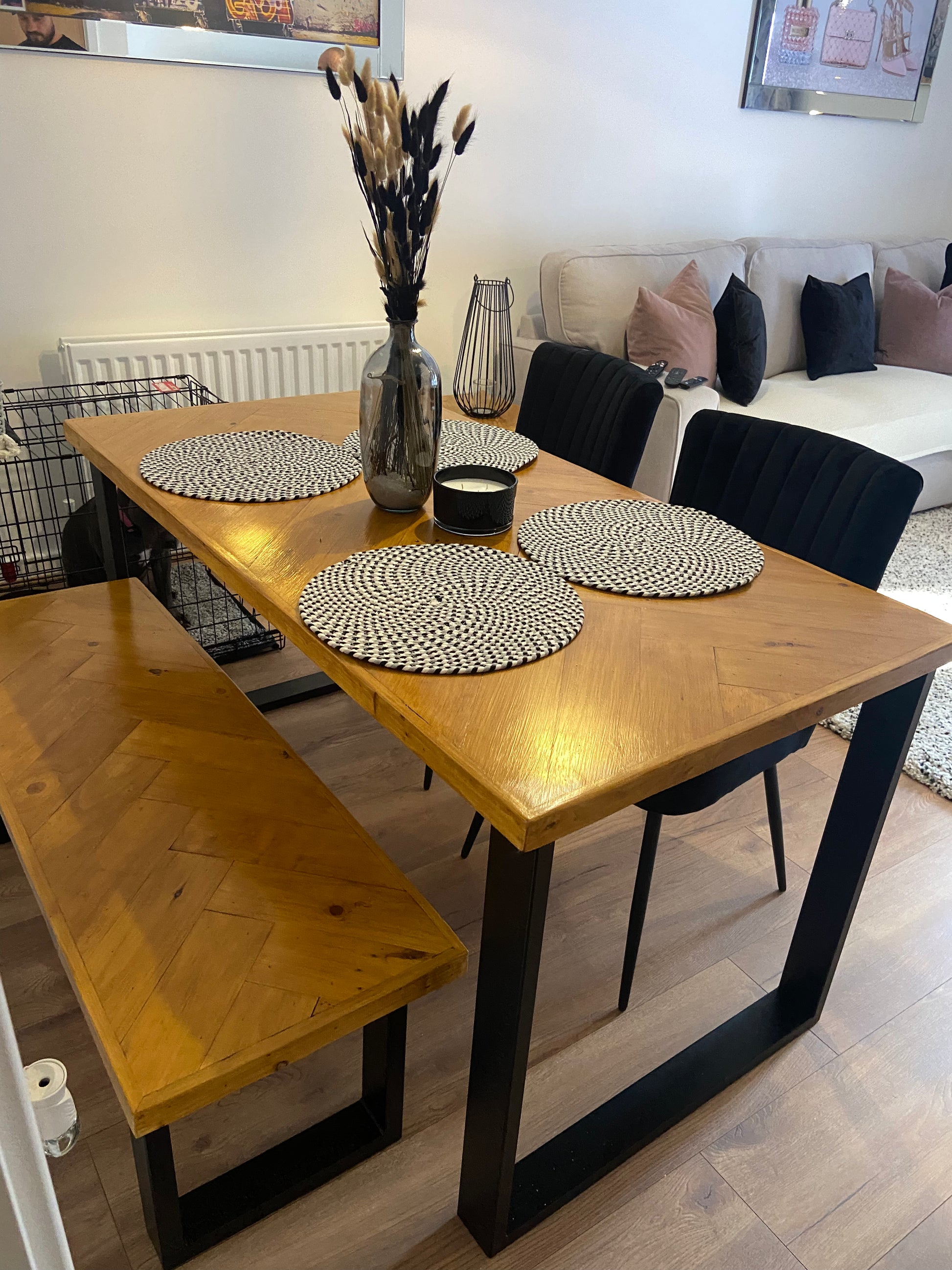 Handcrafted herringbone dining table made from reclaimed wood
