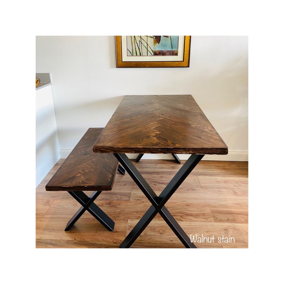 Handcrafted herringbone dining table made from reclaimed wood