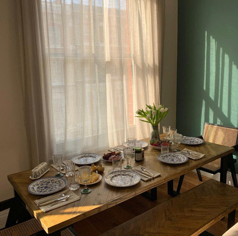 Handcrafted herringbone dining table made from reclaimed wood