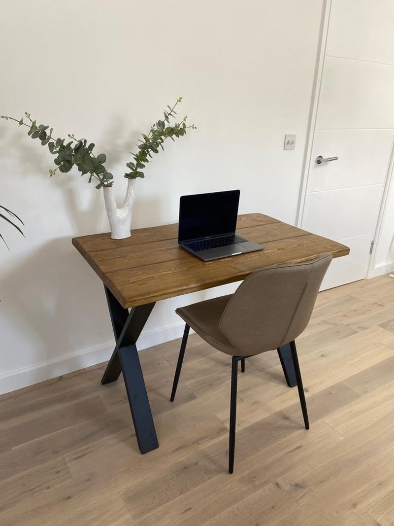 Handmade industrial desk made from reclaimed scaffold boards with steel legs – rustic wood workstation for home office or computer use.