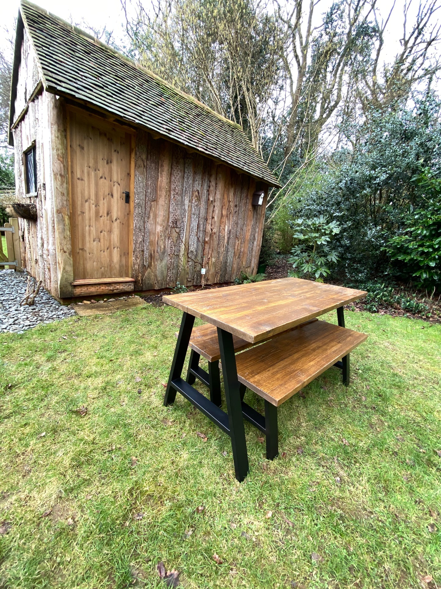 Handcrafted outdoor dining table made from reclaimed scaffold boards