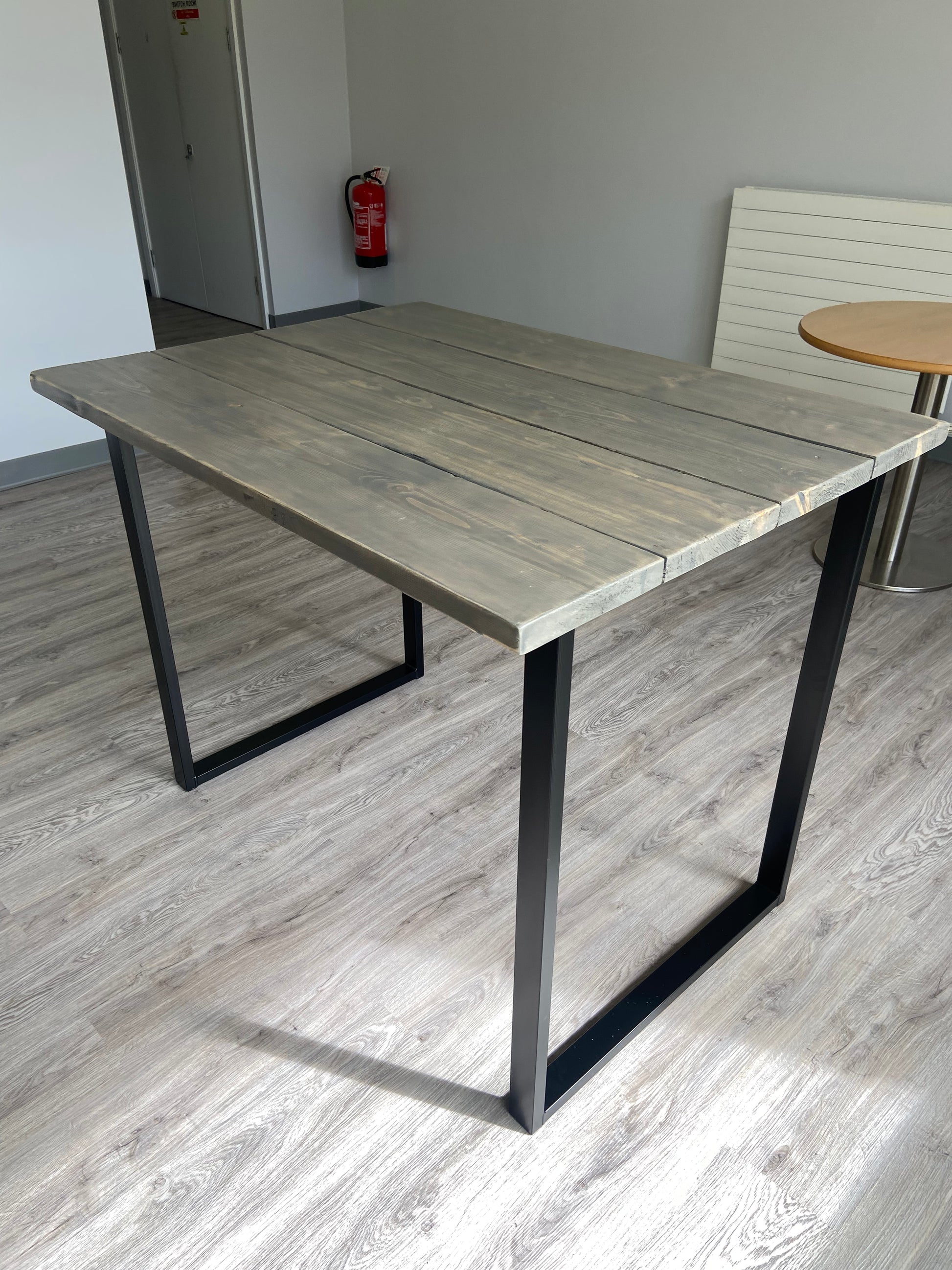 Handmade breakfast bar crafted from reclaimed scaffold boards