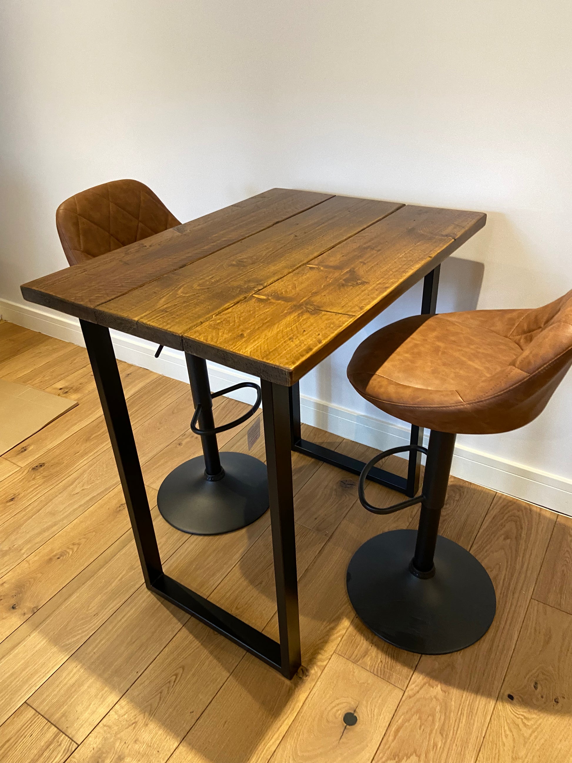 Handmade breakfast bar crafted from reclaimed scaffold boards