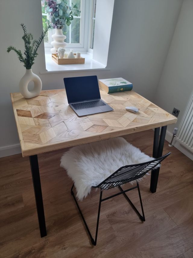 Handmade desk with 3D block pattern top crafted from reclaimed wood and industrial metal legs – sustainable design for home office or studio.